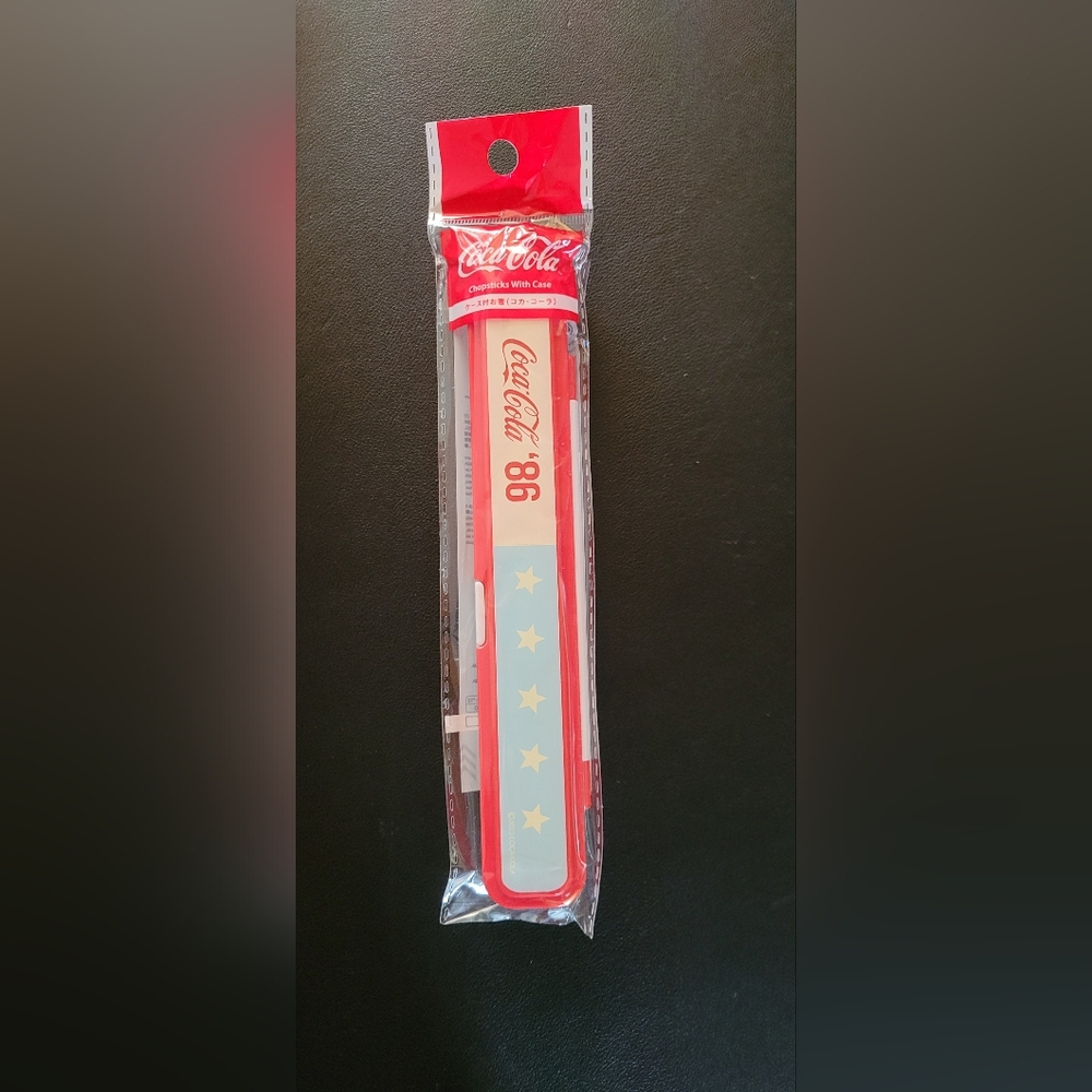 Coca Cola chopsticks and plastic box